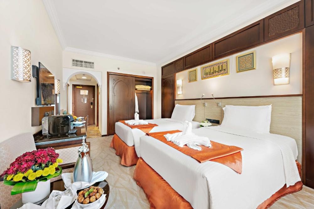 Bright guest room at Anjum Hotel Makkah Location