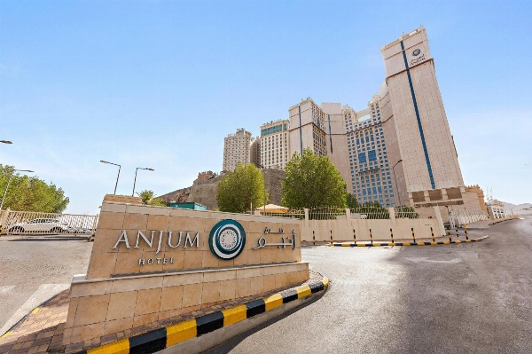 Main entrance of Anjum Makkah lit in daylight