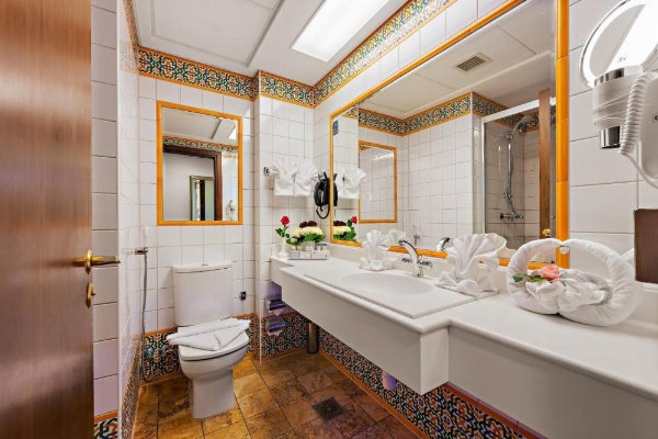 Elegant white bathroom at Anjum Hotel Makkah Mecca